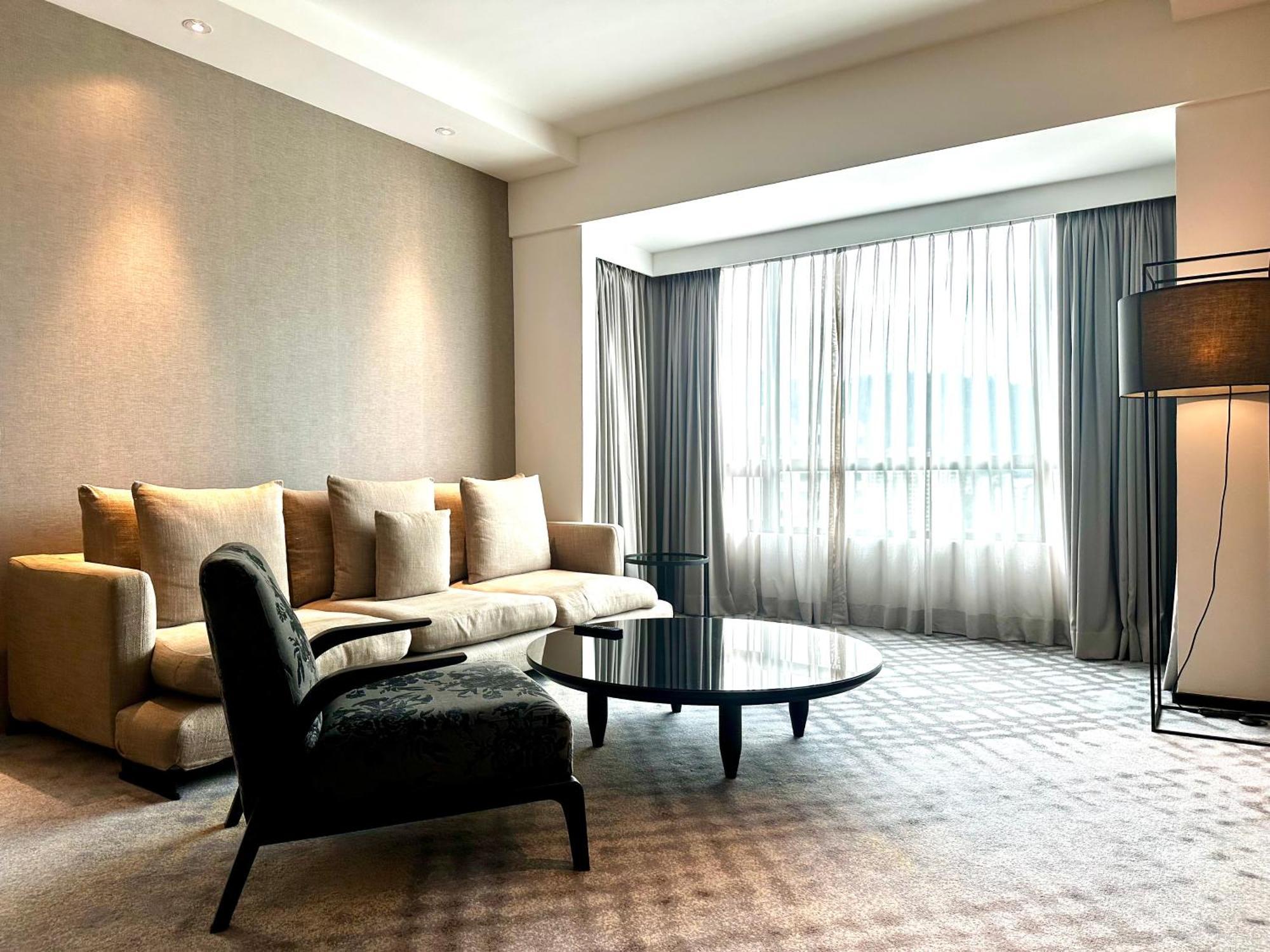 G Hotel Gurney George Town Exterior photo A living room in a suite at the Mandarin Oriental, Tokyo